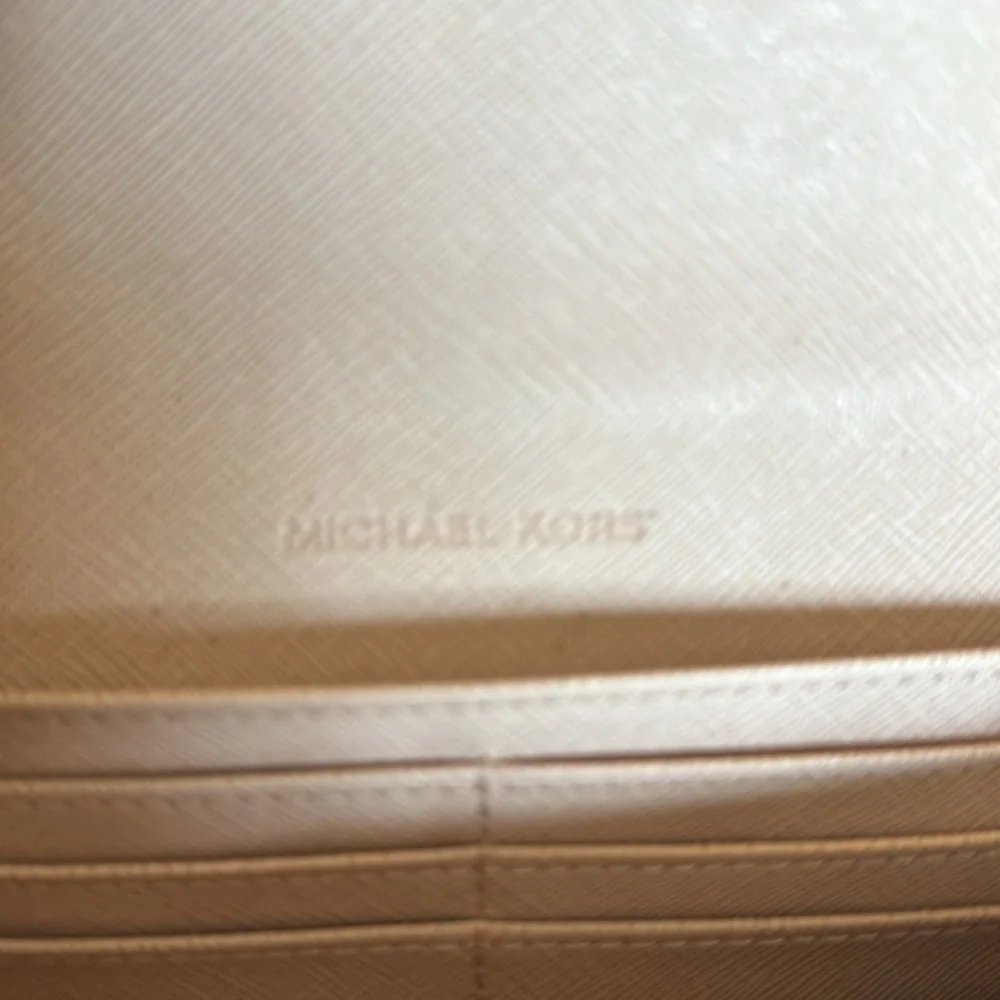 NWT-Michael Kors leather Fulton wallet. Color is call Ballet ( pale pink)